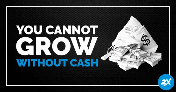 a pile of money with the words you cannot't grow without cash.